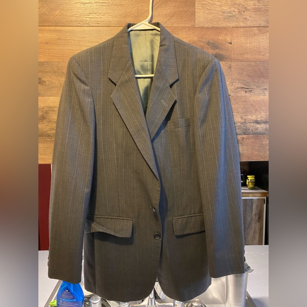 Gentry sport coat.  No size tag but it fits like a 38 long.  Measurements pictur